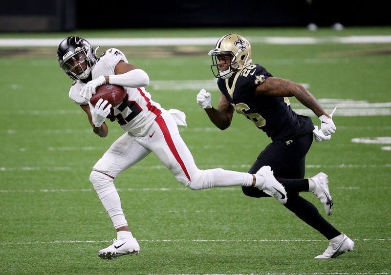 Russell Gage catches a pass against the Saints.