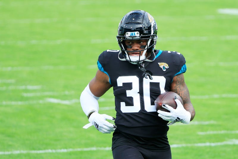 James Robinson carries the ball prior to a game.