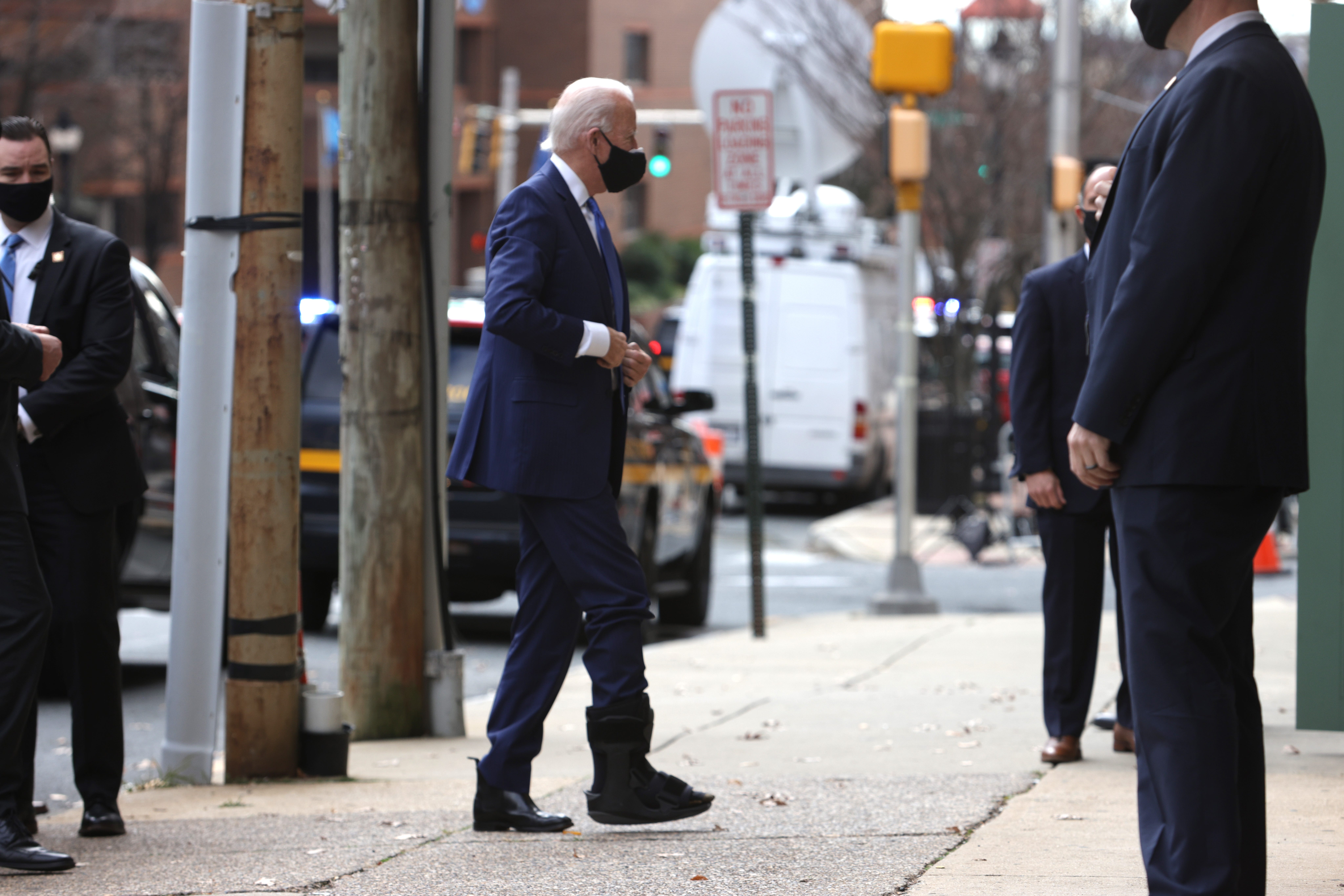 Photos Joe Biden Shows Off The Walking Boot