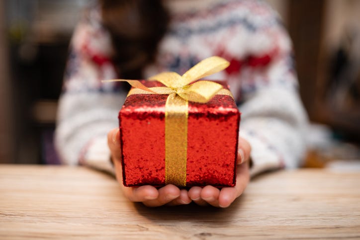 Child with a present box
