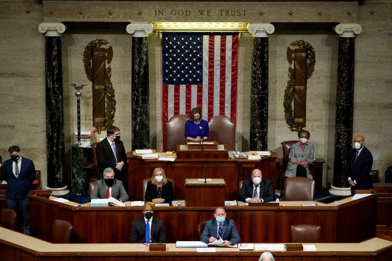 U.S. Speaker of the House Nancy Pelosi (C) (D-CA) speaks in the House Chamber during a reconvening of a joint session of Congress on January 06, 2021 in Washington, DC. Members of Congress returned to the House Chamber after being evacuated when protesters stormed the Capitol and disrupted a joint session to ratify President-elect Joe Biden's 306-232 Electoral College win over President Donald Trump.