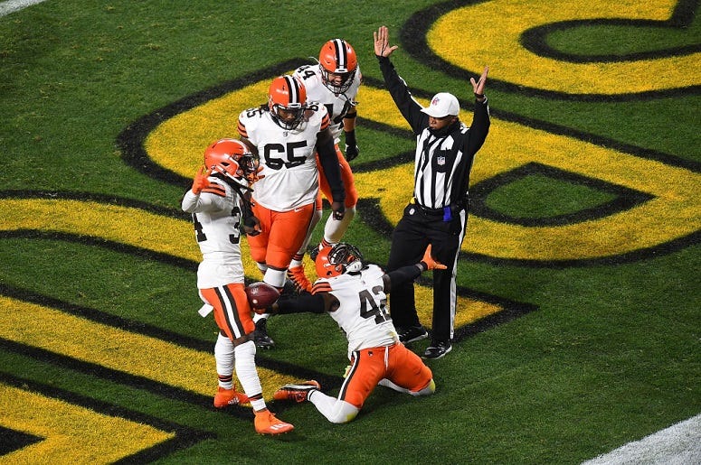 Karl Joseph #42 of the Cleveland Browns celebrates a touchdown during the first half of the AFC Wild Card Playoff game against the Pittsburgh Steelers