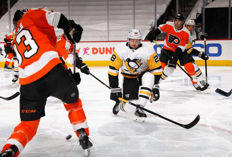 Marcus Pettersson #28 of the Pittsburgh Penguins blocks a third period shot by Jakub Voracek #93