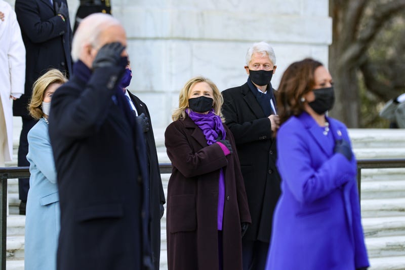 U.S. President Joe Biden and Vice President Kamala Harris attend a wreath-laying ceremony at Arlington National Cemetery's Tomb of the Unknown Soldier after the 59th Presidential Inauguration ceremony at the U.S. Capitol, as former U.S. President George W. Bush and Laura Bush, and former U.S. President Bill Clinton and former Secretary of State Hillary Clinton look on, January 20, 2021 in Arlington, Virginia. During today's inauguration ceremony Joe Biden becomes the 46th president of the United States.