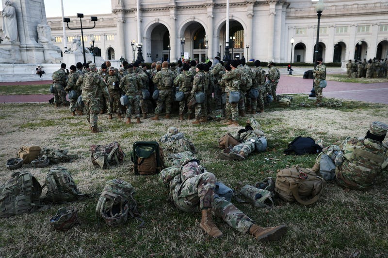 Members of the National Guard wait to depart Union Station as the city remains under tight security during the presidential inauguration on January 20, 2021 in Washington, DC. Law enforcement and state officials are on high alert for potentially violent protests as Joe Biden is sworn in as the 46th president of the United States at today's inauguration ceremony. (Photo by Spencer Platt/Getty Images)