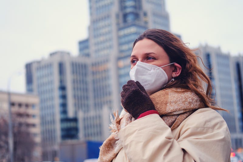 Woman wearing n95 mask