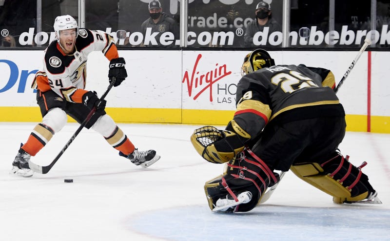 Carter Rowney #24 of the Anaheim Ducks takes a shot against Marc-Andre Fleury #29 of the Vegas Golden Knights in the third period of their game at T-Mobile Arena on February 11, 2021 in Las Vegas, Nevada.