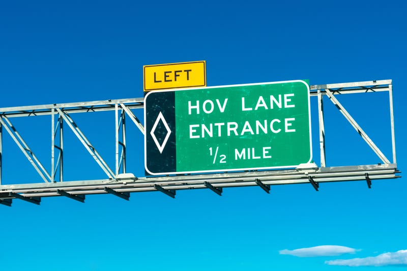 High occupancy vehicle lane entrance overhead road sign