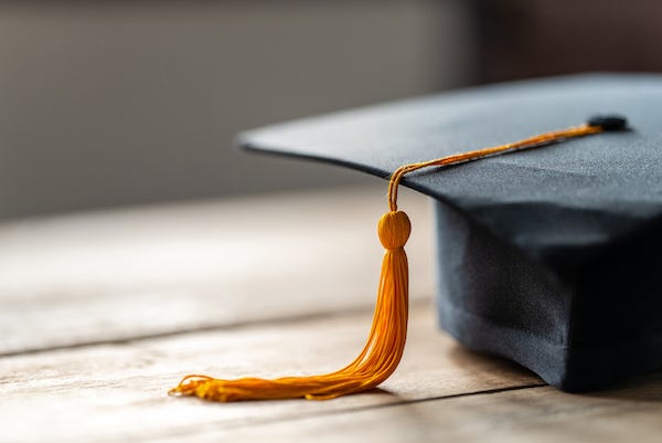Close up Black graduation cap and yellow tassel