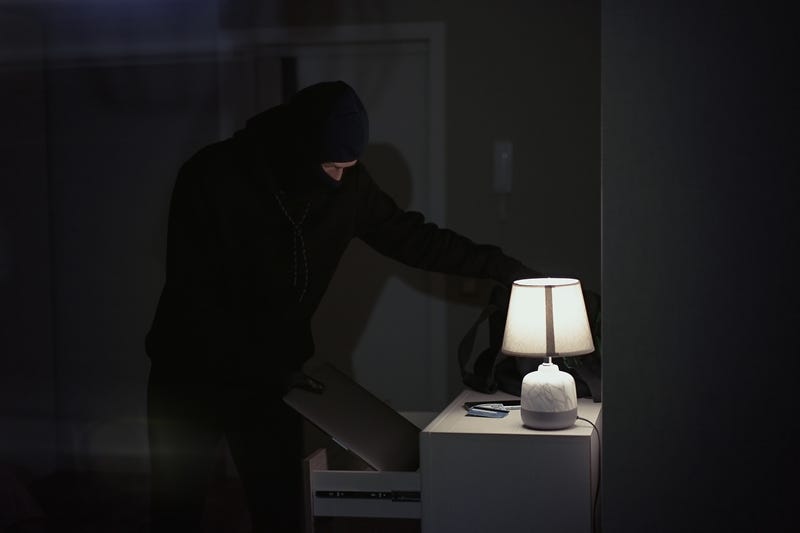 Burglar stealing.