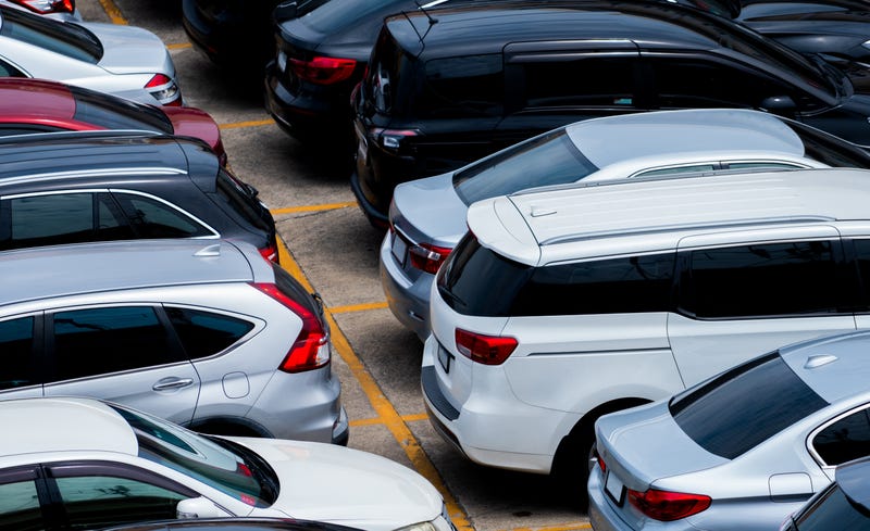 stock image of cars parked in a parking lot