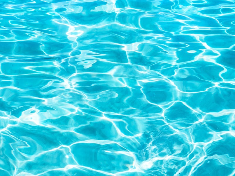Surface of water in swimming pool