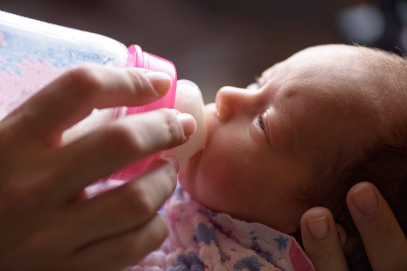 Baby drinking formula