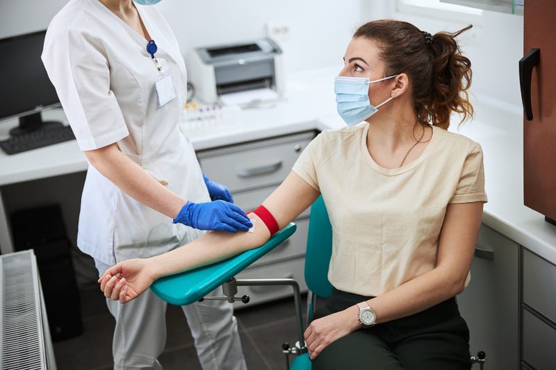 Someone donating blood.