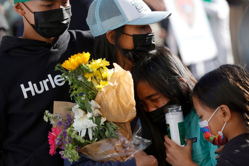 Family members of Santa Clara Valley Transportation Authority (VTA) light rail yard shooting victim Paul Megia react during a vigil at San Jose City Hall on May 27, 2021 in San Jose, California.