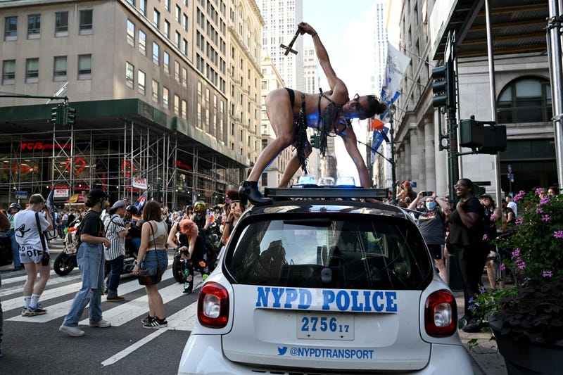 Mary Magdalene dance on top of an NYPD police car during the 29th Annual New York City Dyke March on June 26, 2021 in New York City. The Dyke March which calls itself a march protest, rather than a parade, is a "demonstration of our First Amendment right to protest" according to their website. Due to the coronavirus pandemic the march was held virtually in 2020. This year’s march began at Bryant Park and ended in Washington Square Park.