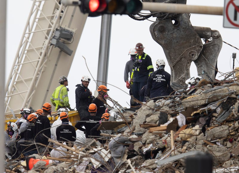 Search and rescue teams look for possible survivors in Surfside, Florida.