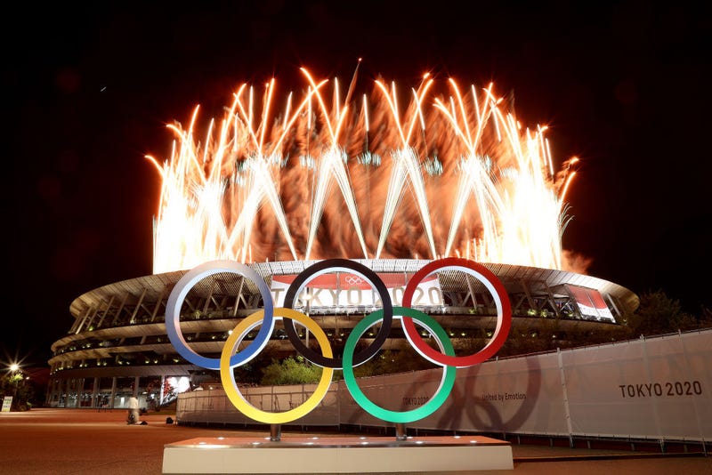 The Olympic Rings are seen outside the stadium as fireworks go off during the Opening Ceremony of the Tokyo 2020 Olympic Games at Olympic Stadium on July 23, 2021 in Tokyo, Japan.
