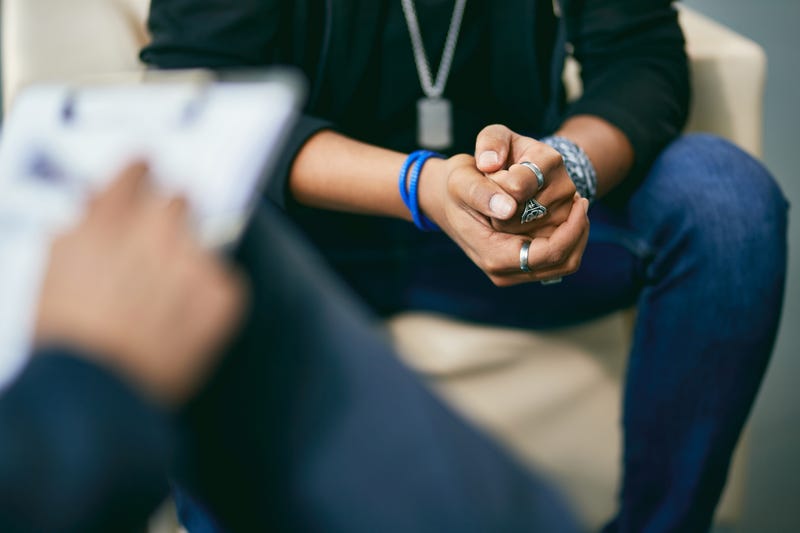close up image of doctor talking to patient