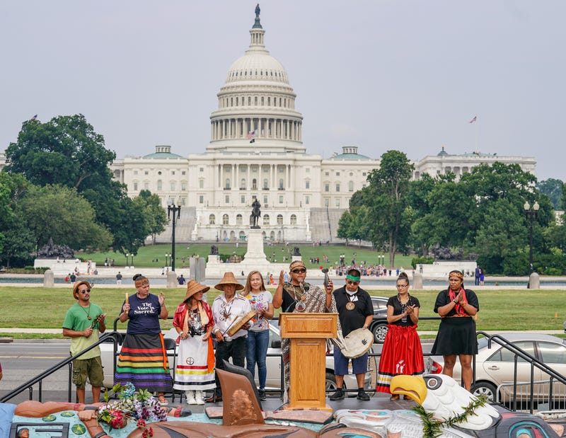 WASHINGTON, DC - JULY 29: Lummi carver and activists Phreddie Lane speaks during a welcome ceremony for the Red Road Totem pole on the National Mall on July 29, 2021 in Washington, DC. The totem pole, carved by the House of Tears Carvers of the Lummi Nation was delivered to the Biden administration during the welcome ceremony after the House of Tears Carvers of the Lummi Nation transported the totem pole from Washington state to Washington, DC.