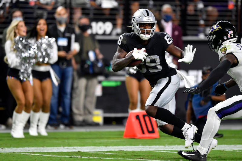 Bryan Edwards #89 of the Las Vegas Raiders runs with the ball against the Baltimore Ravens during overtime at Allegiant Stadium on September 13, 2021