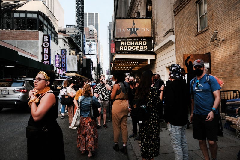 Fans, media and cast members gather outside the Richard Rodgers Theatre where the musical "Hamilton" is being prepared for opening for the first time since March 2020 when it was closed due to the COVID-19 pandemic on September 14, 2021 in New York City.