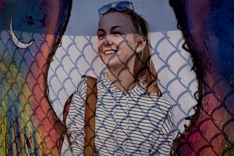 A memorial poster of Gabby Petito hangs on a fence across the street from the funeral home where the memorial service for the murdered woman is being held, September 26, 2021 in Holbrook, Long Island, New York.