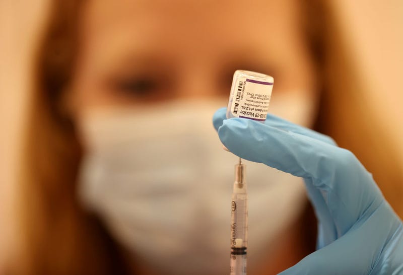 Safeway pharmacist Ashley McGee fills a syringe with the Pfizer COVID-19 booster vaccination at a vaccination booster shot clinic on October 01, 2021 in San Rafael, California. Marin County opened its first COVID-19 booster shot clinic inside a former Victoria's Secret store at Northgate Mall. The clinic is giving priority to residents over 75 years old but is open to all ages that are eligible to receive the Pfizer booster. (Photo by Justin Sullivan/Getty Images)