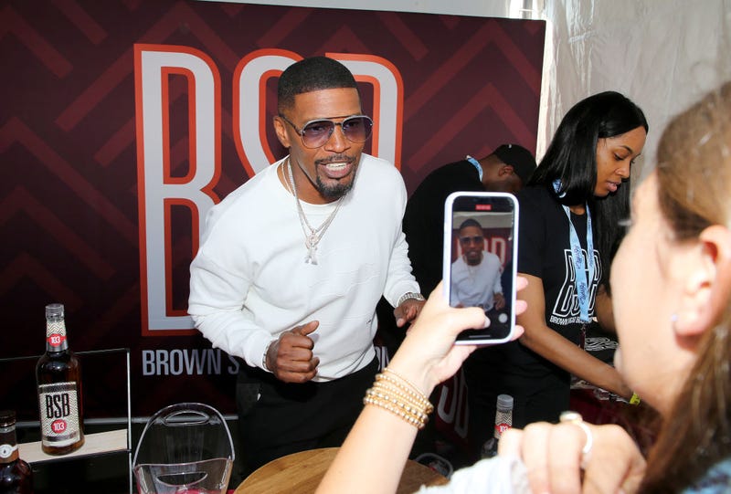 Jamie Foxx participates in a Brown Sugar Bourbon tasting during Southern Glazer's Wine & Spirits TRADE DAY at the Grand Tasting hosted by Wine Spectator during the Food Network & Cooking Channel New York City Wine & Food Festival presented by Capital One at Pier 76 on October 15, 2021 in New York City