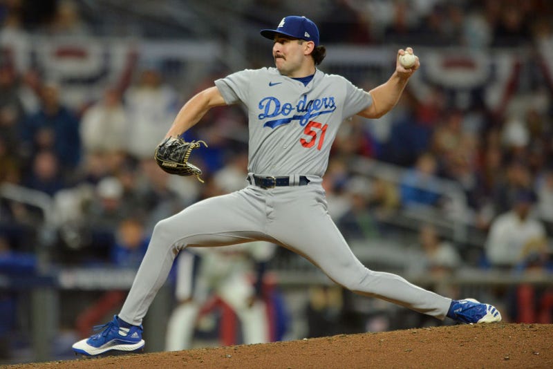 Alex Vesia #51 of the Los Angeles Dodgers delivers a pitch against the Atlanta Braves during the sixth inning.