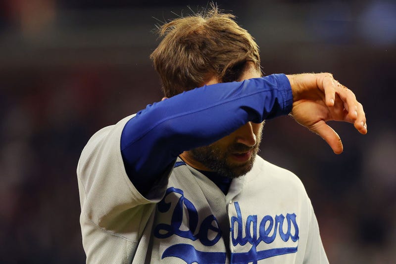 Chris Taylor #3 of the Los Angeles Dodgers reacts after being tagged out in a rundown by Dansby Swanson #7 of the Atlanta Braves (not pictured) during the ninth inning.