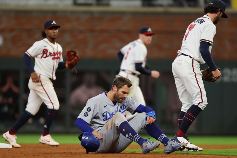 Chris Taylor #3 of the Los Angeles Dodgers reacts after being tagged out in a rundown by Dansby Swanson #7 of the Atlanta Braves (not pictured) during the ninth inning of Game One.