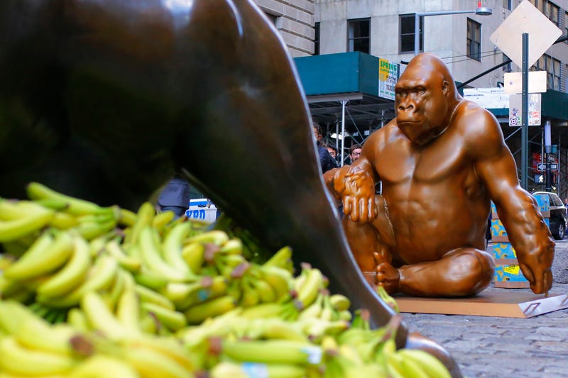 A Harambe statue is seen in front of the Charging Bull statue on October 18, 2021 in New York City