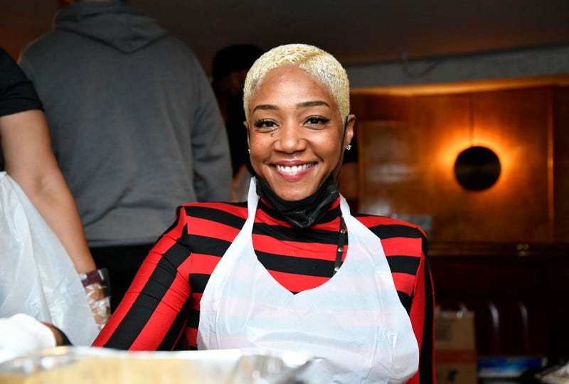 Comedian Tiffany Haddish serves food at the Laugh Factory's 41st free Thanksgiving dinner at The Laugh Factory on November 25, 2021 in West Hollywood, California.
