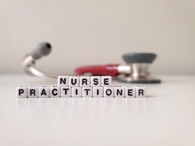 blocks that spell out Nurse Practitioner