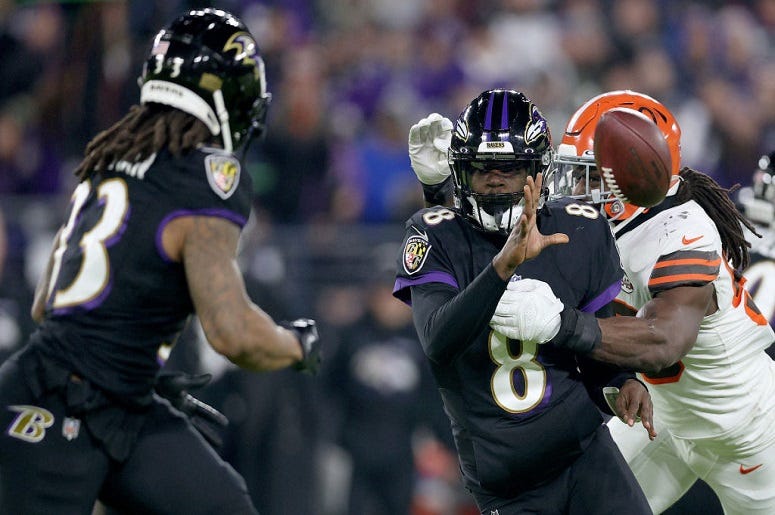 Lamar Jackson #8 of the Baltimore Ravens passes during a game against the Cleveland Browns