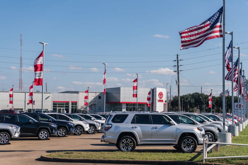 Vehicles sit on the lot at the Joe Myers Toyota dealership on January 04, 2022 in Houston, Texas. Toyota Motor Corp has been ranked the No. 1 automaker in America after surpassing General Motors in auto sales for the first time since 1931. Automakers reported Toyota having sold 2.332 million vehicles in the United States, in 2021, compared to 2.218 million for General Motors. (Photo by Brandon Bell/Getty Images)