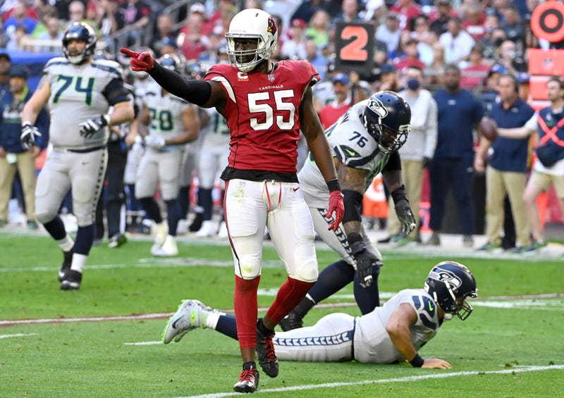 Chandler Jones #55 of the Arizona Cardinals celebrates after hitting Russell Wilson #3 of the Seattle Seahawks during the second quarter at State Farm Stadium