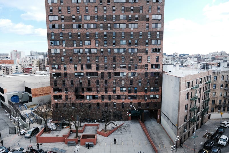 The Bronx apartment building stands a day after a fire swept through the complex killing at least 17 people and injuring dozens of others, many of them seriously on January 10, 2022 in New York City