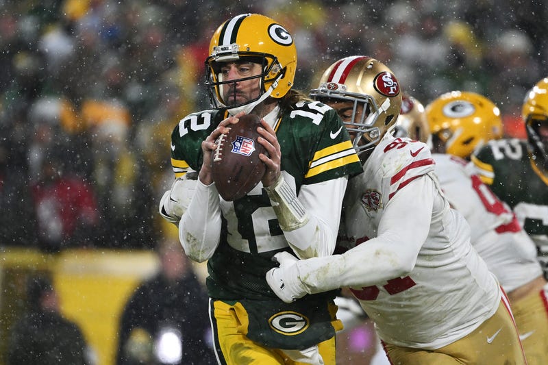 Aaron Rodgers and Arik Armstead
