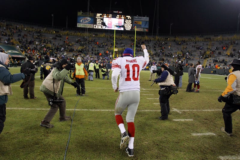 Eli Manning celebrates after the Giants beat the Green Bay Packers in the 2011 NFC title game