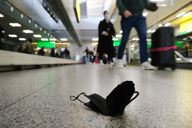 A mask is seen on the ground at John F. Kennedy Airport on April 19, 2022 in New York City.