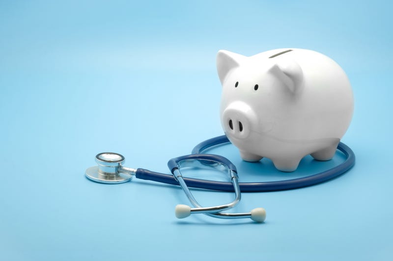Piggy bank with stethoscope