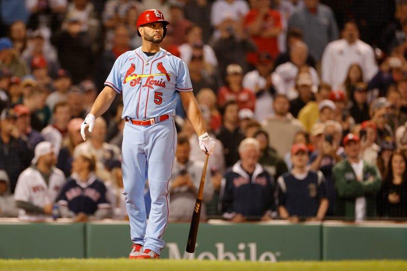 Albert Pujols stands with a bat at a St. Louis Cardinals game.