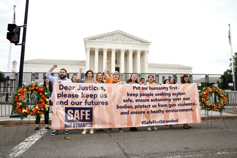 The Safe Not Stranded Coalition protest the "Remain in Mexico" policy" outside the US Supreme Court on June 22, 2022 in Washington, DC. (Photo by Paul Morigi/Getty Images for Safe Not Stranded Campaign)