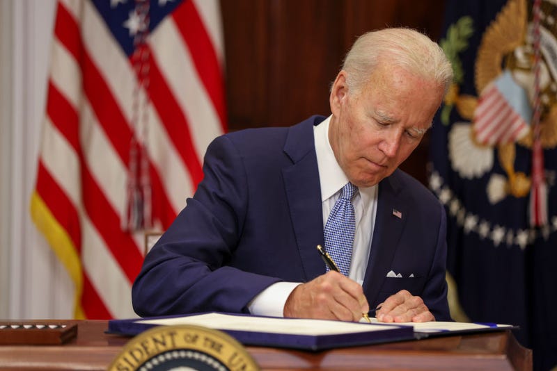 President Joe Biden signs the Bipartisan Safer Communities Act into law in the Roosevelt Room of the White House on June 25, 2022 in Washington, DC. The legislation is the first new gun regulations passed by Congress in more than 30 years. (Photo by Tasos Katopodis/Getty Images)