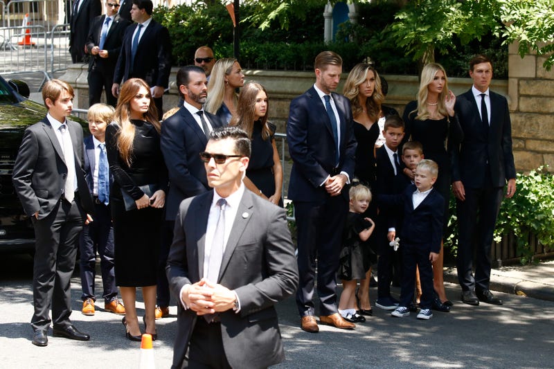 Kimberly Guilfoyle, Donald Trump Jr., Vanessa Trump, Eric Trump, Lara Trump, Ivanka Trump and Jared Kushner pose with their children at the funeral of Ivana Trump at St. Vincent Ferrer Roman Catholic Church on July 20, 2022 in New York City