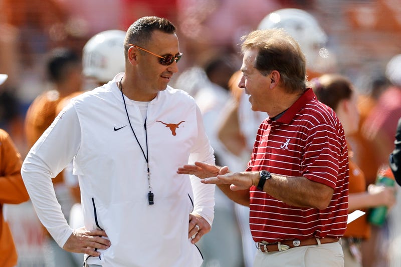 Steve Sarkisian and Nick Saban