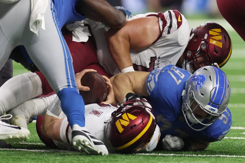 The Detroit Lions' Aidan Hutchinson sacks Carson Wentz during the Lions' 36-27 Week 2 victory over the Washington Commanders.