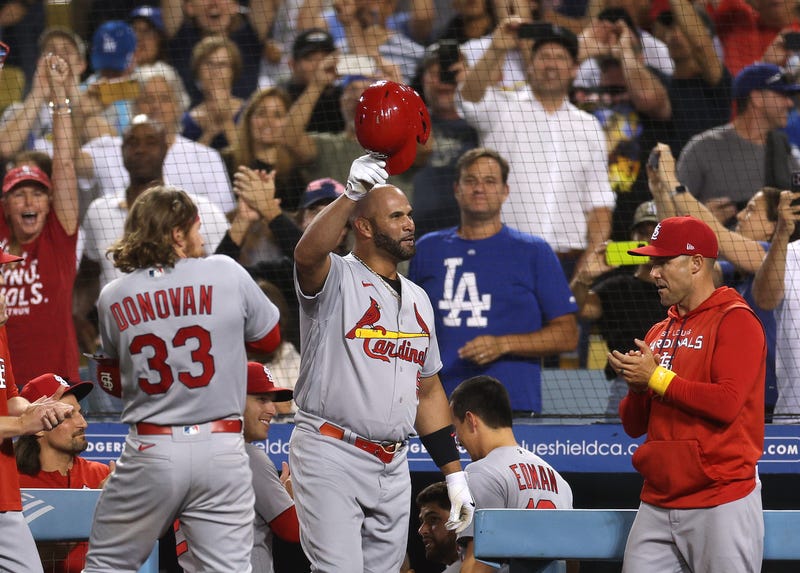 pujols holding his helmet